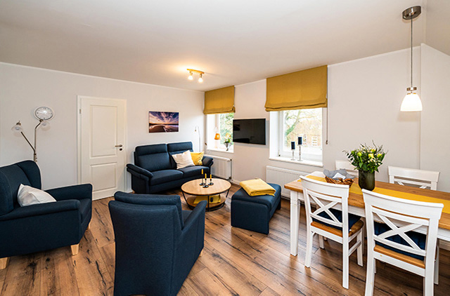 Ferienwohnung Fehmarn Sitzecke mit Esszimmertisch