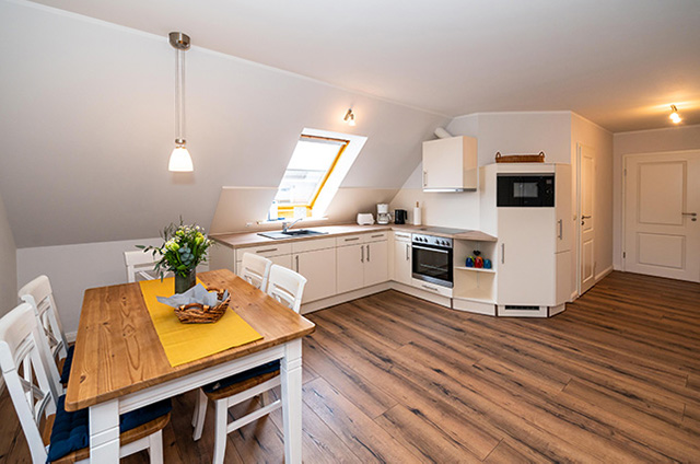 Ferienwohnung Fehmarn Esstisch mit Küche